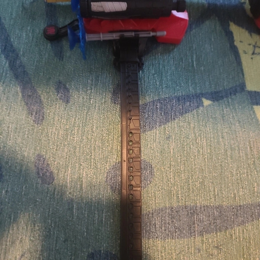 Red and Black Toy Blaster